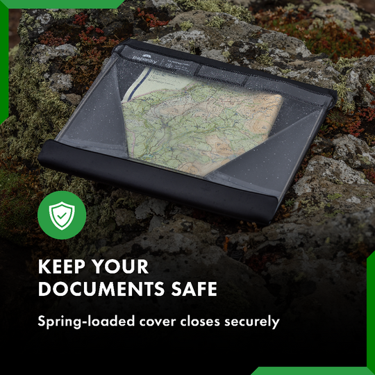 A waterproof clipboard on a rock covered in lichen
